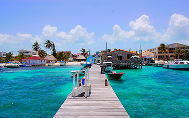 A walkway over a waterbody in Belize Islands