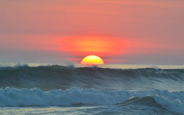 Sun setting beside the ocean in Costa Rica