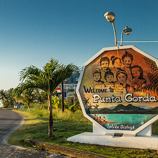 Signboard welcoming tourists to Punta Gorda in Toledo