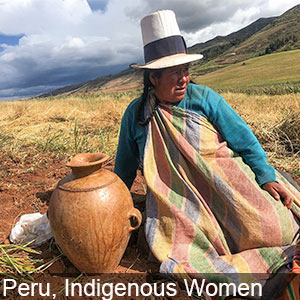 An indigenous Peruvian woman in reflective mood