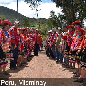 Peruvian people in traditional attire doing a group dance