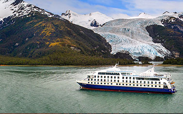 Modern expedition cruise ships navigating waterways in Chile